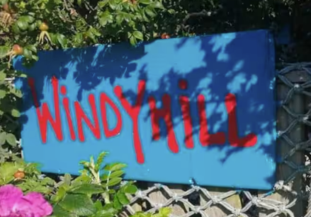 Windy Hill, chalet rental accommodation, Pennard, Gower, Swansea - sign